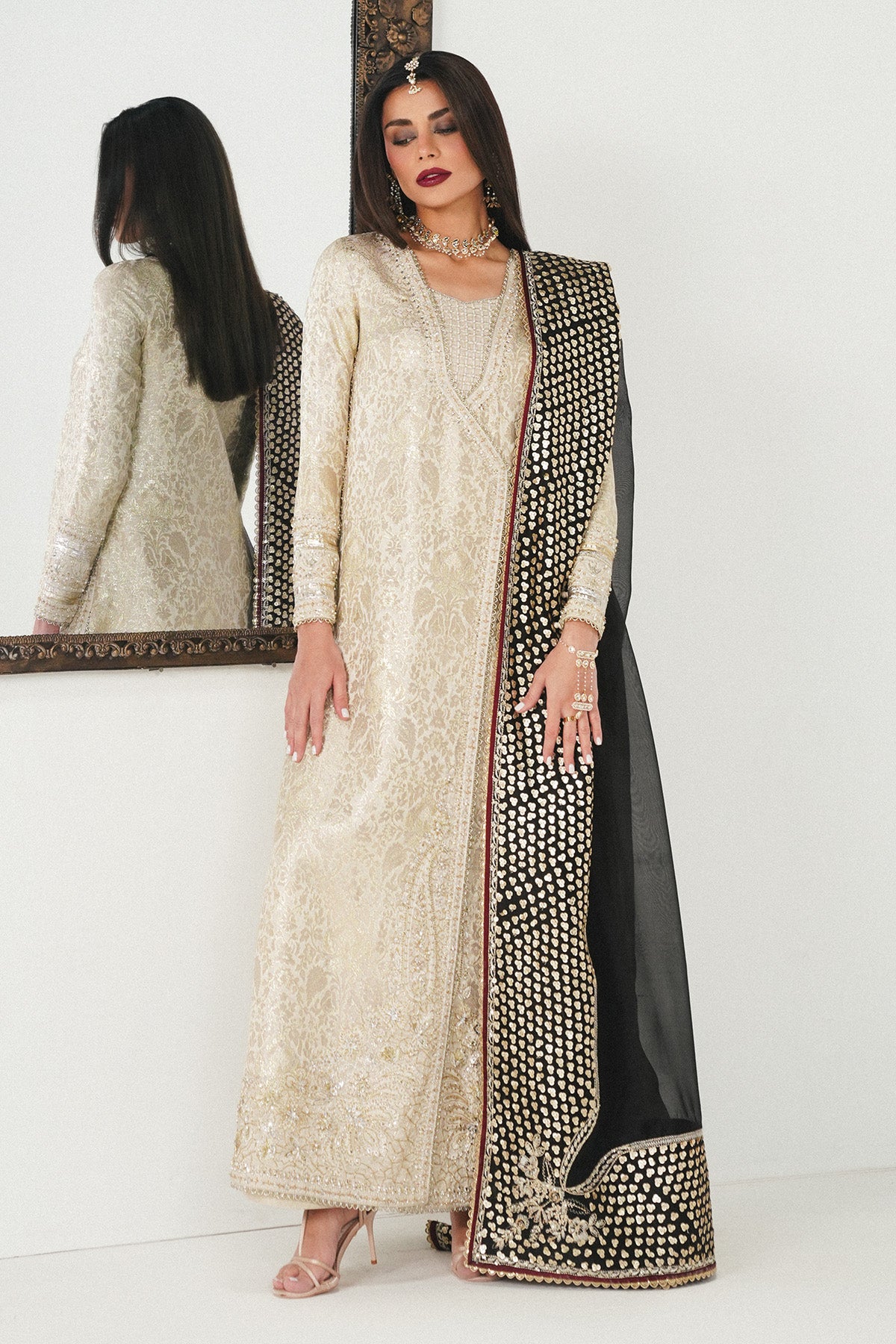 Saad Bin Shahzad Meznah – off-white gold jamawar angrakha with black dupatta from Festive Pret'26